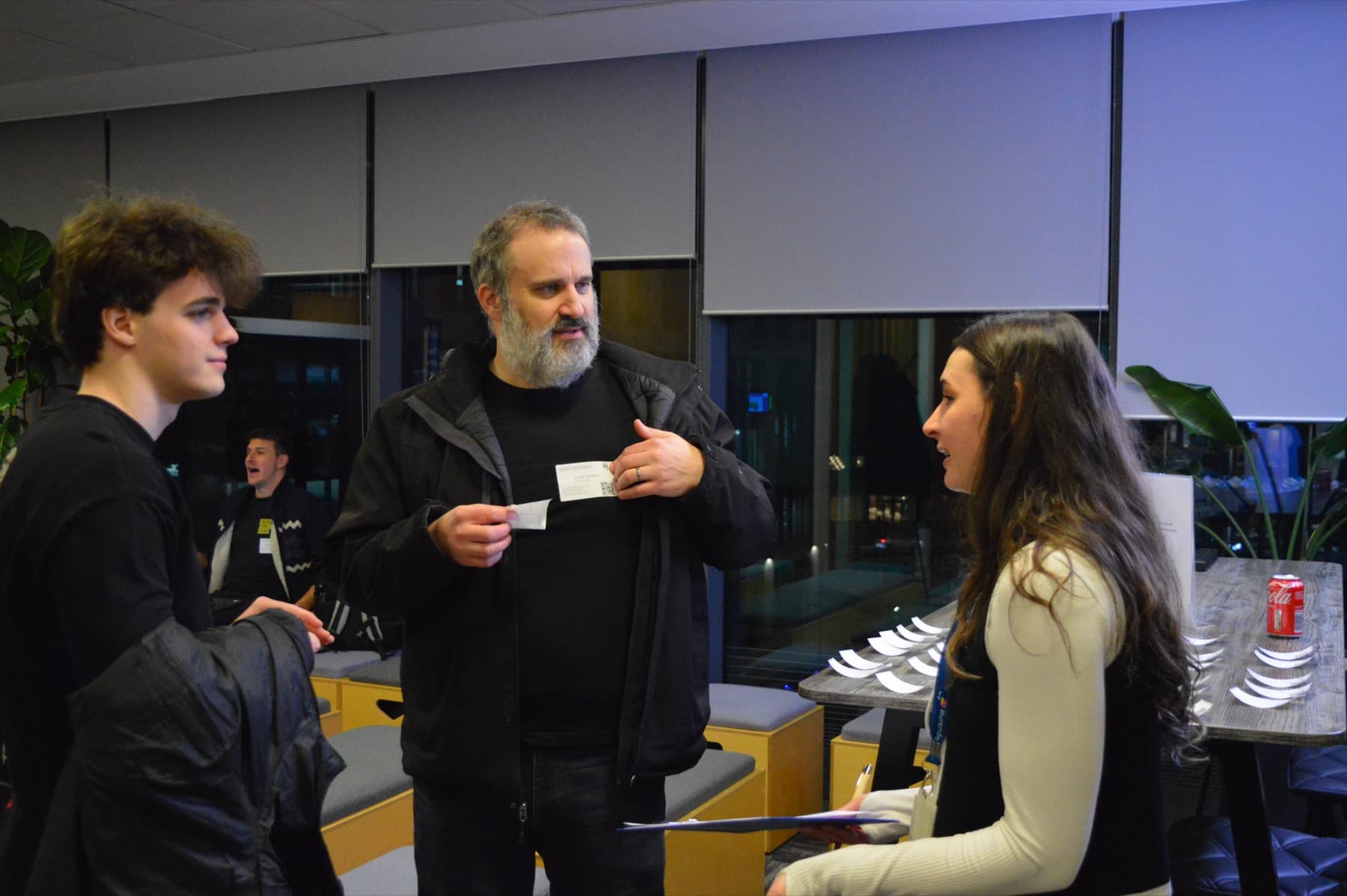 Attendees chatting during the networking break